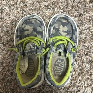 Toddler Hey Dude shoes. Size 6. Camo with dinosaurs.